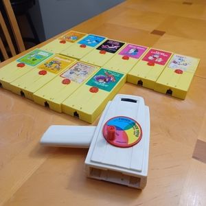 Vintage Fisher Price Movie Viewer plus 10 movies